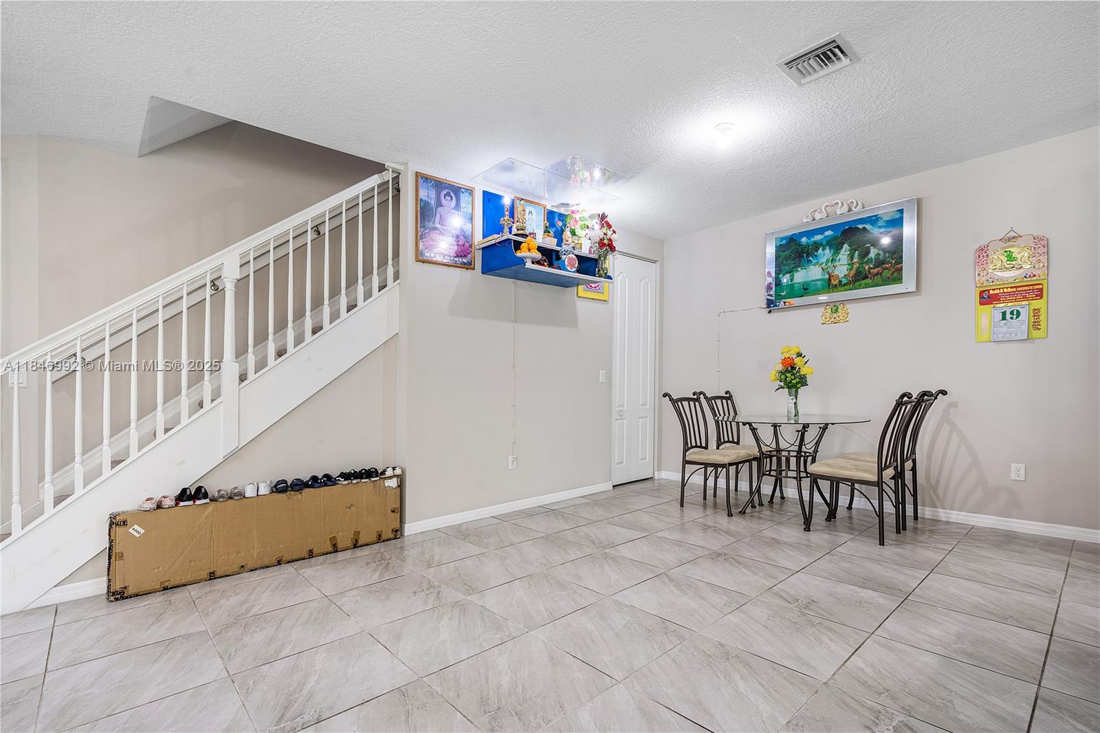 6411 Osprey Landing Street Davie, FL 33314 - Photo 11 of 38 a view of a dining room with furniture