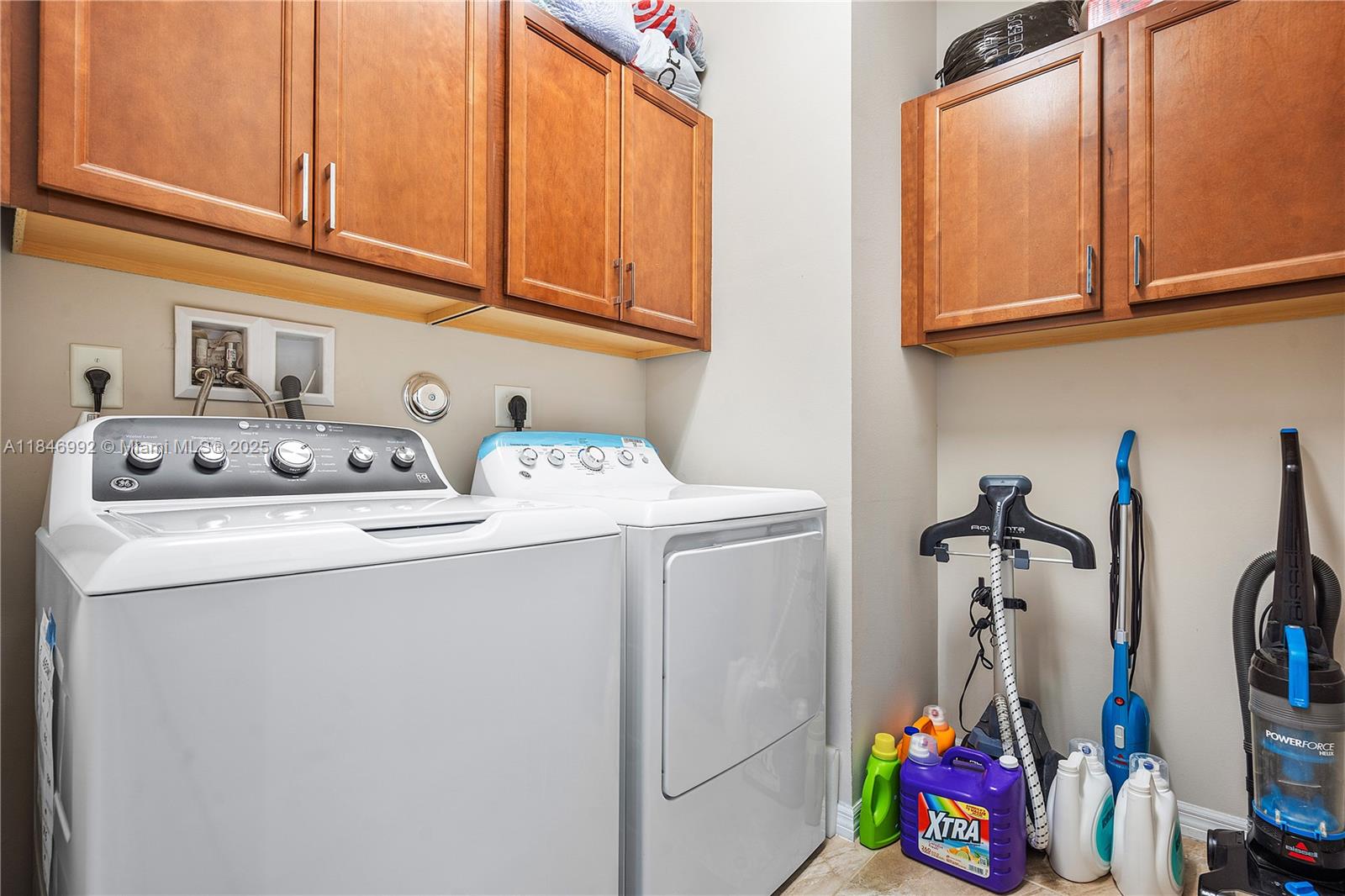 6411 Osprey Landing Street Davie, FL 33314 - Photo 31 of 38 a utility room with dryer and washer