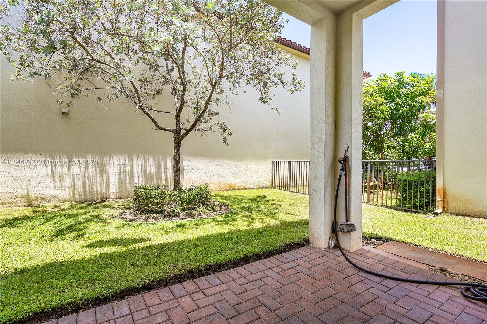 6411 Osprey Landing Street Davie, FL 33314 - Photo 35 of 38 a view of backyard with tub and trees