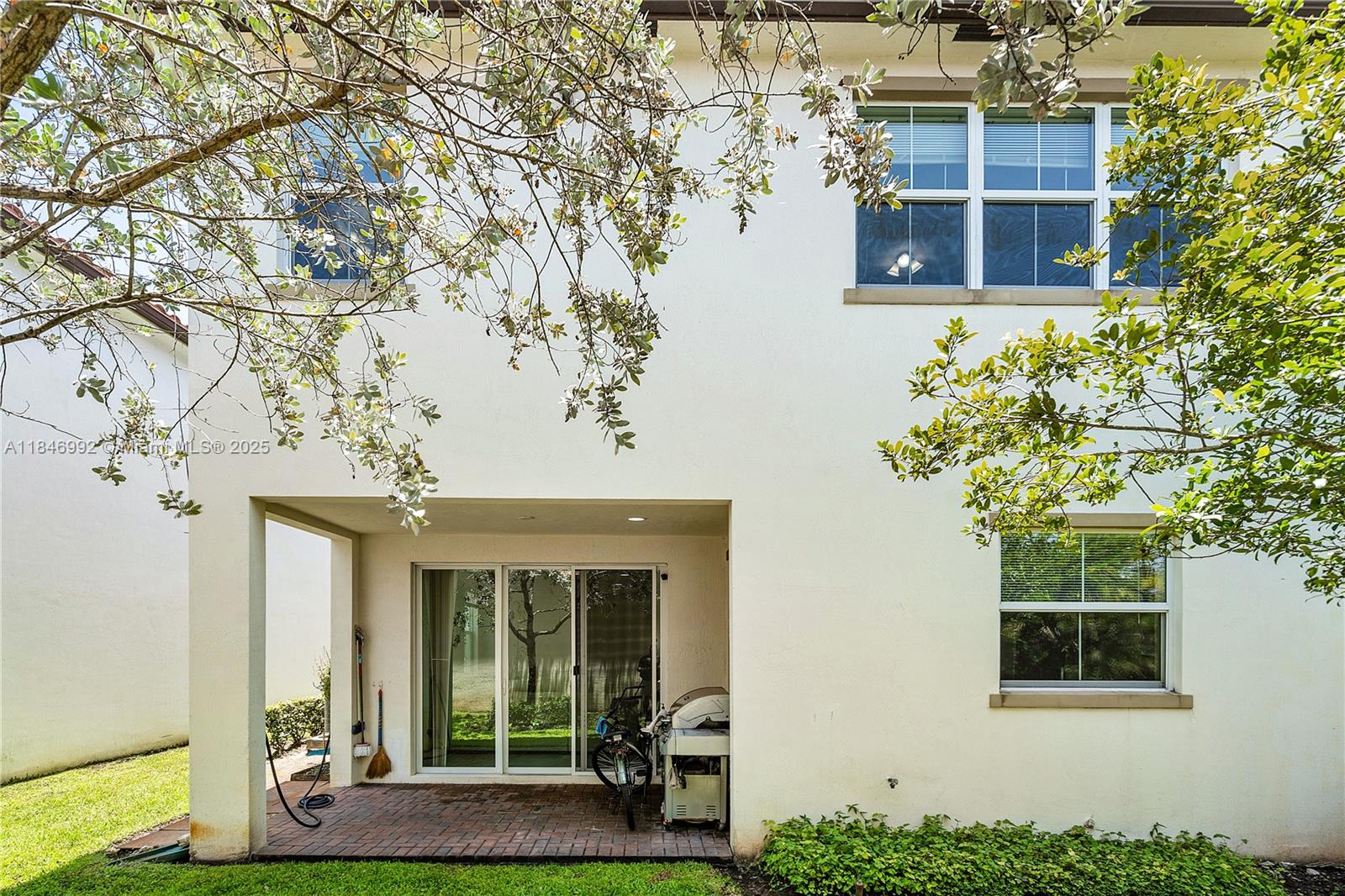 6411 Osprey Landing Street Davie, FL 33314 - Photo 36 of 38 a front view of a house with a yard