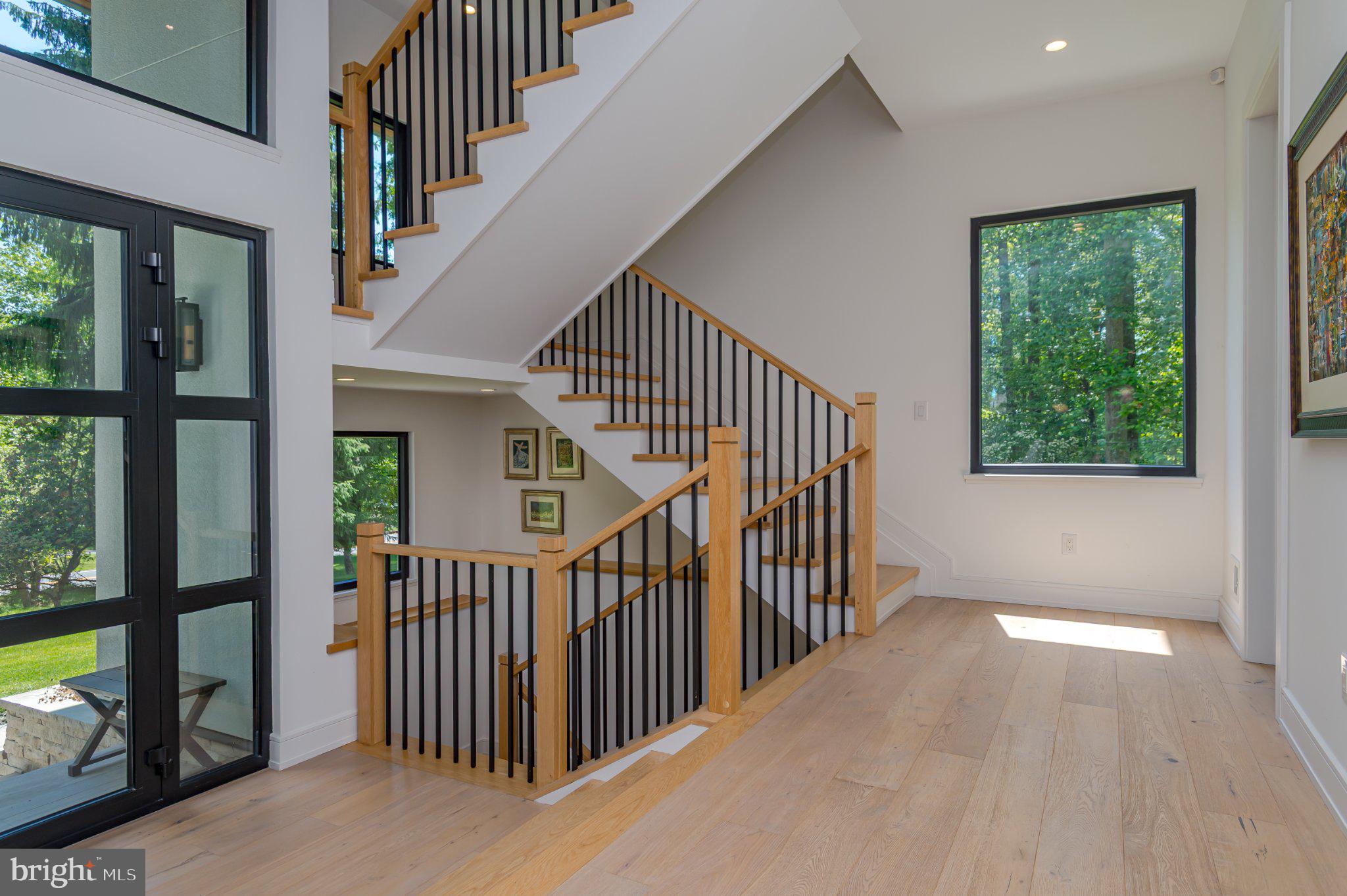 1267 Stuart Road Princeton, NJ 08540 - Photo 3 of 40 Bright and airy entryway with stairs.