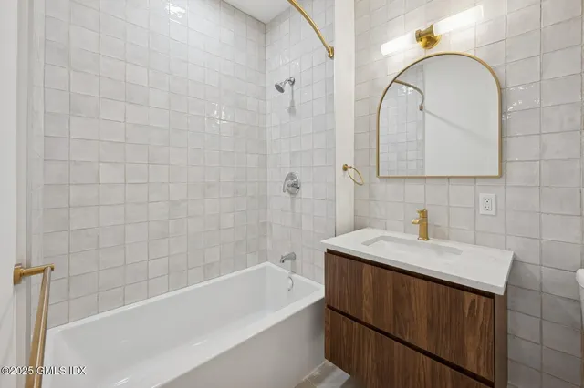 a bathroom with a sink and a bathtub