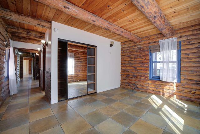 a view of a hallway with an empty room