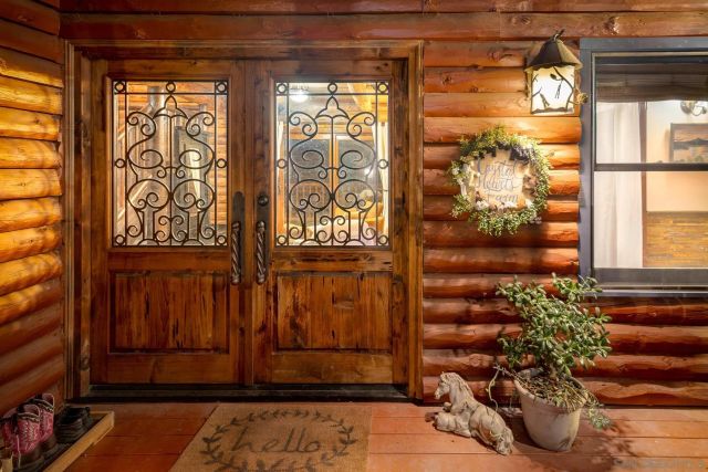 a view of a door and a window