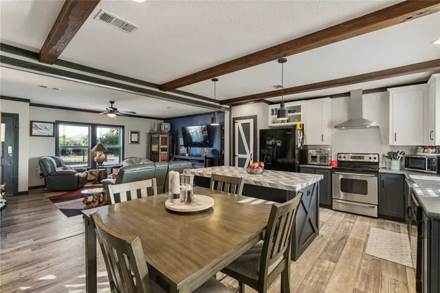 a view of a dining room with furniture