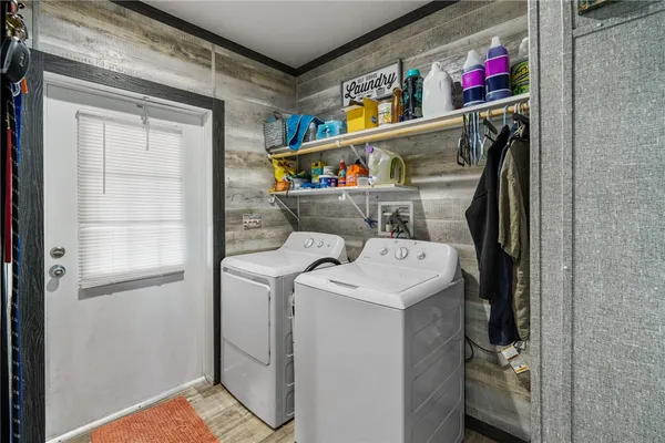 a utility room with dryer and washer