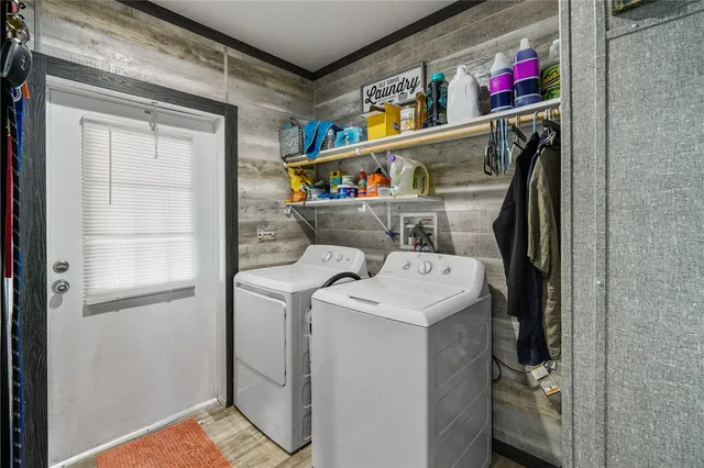 a utility room with dryer and washer