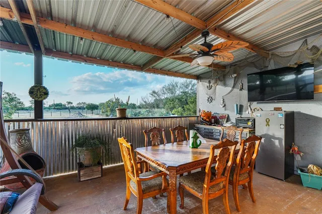 a view of a garage with a bike and car