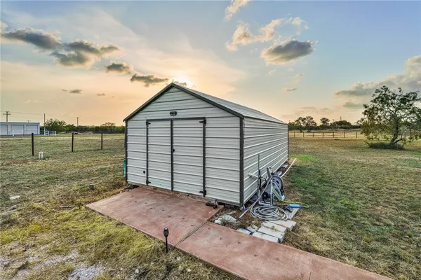 a view of a lake from a yard