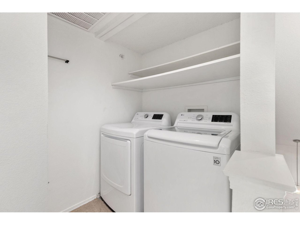 1855 Spaulding Circle Superior, CO 80027 - Photo 13 of 32 a utility room with dryer and washer