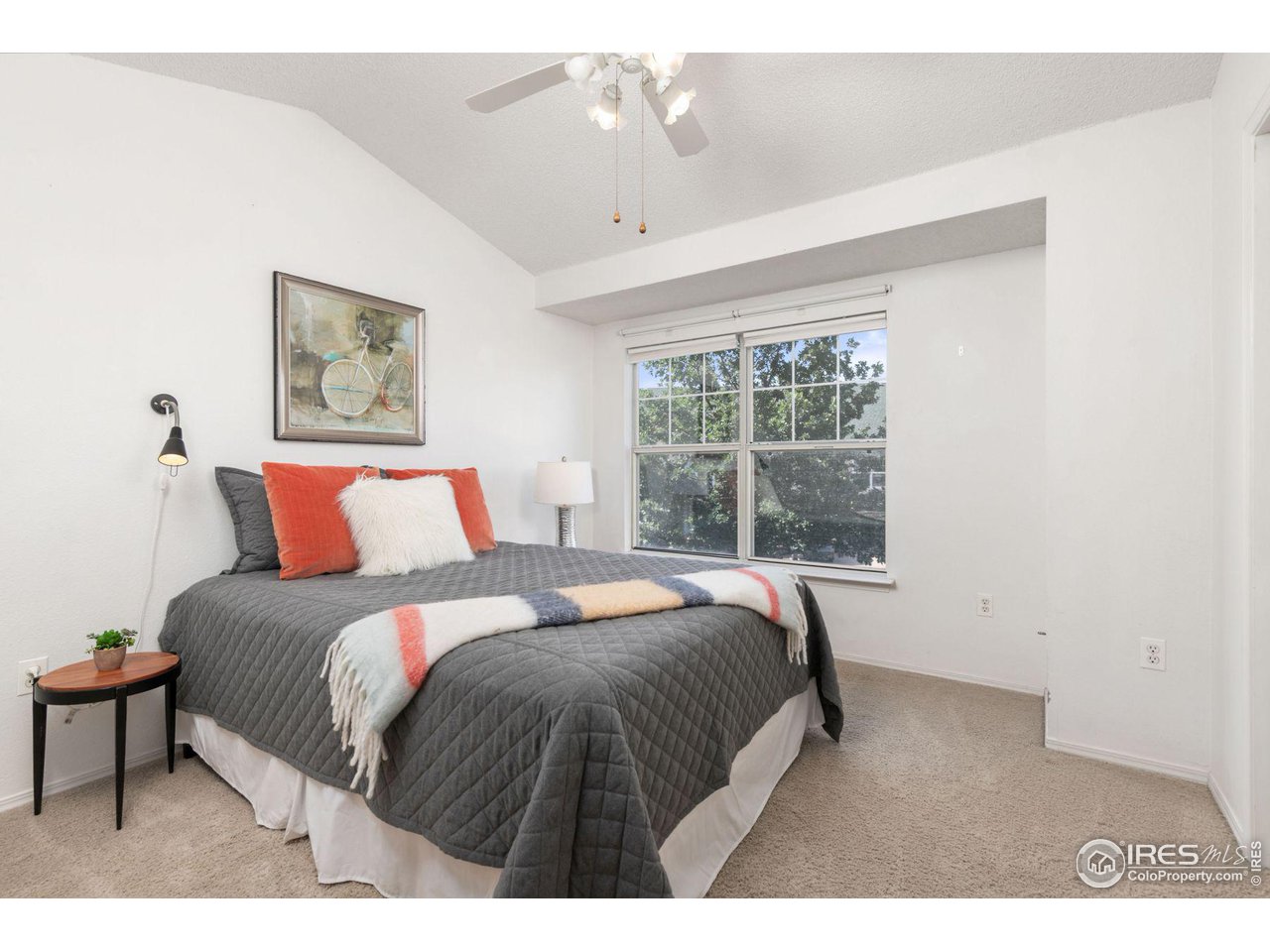 1855 Spaulding Circle Superior, CO 80027 - Photo 14 of 32 a bedroom with a bed and a window