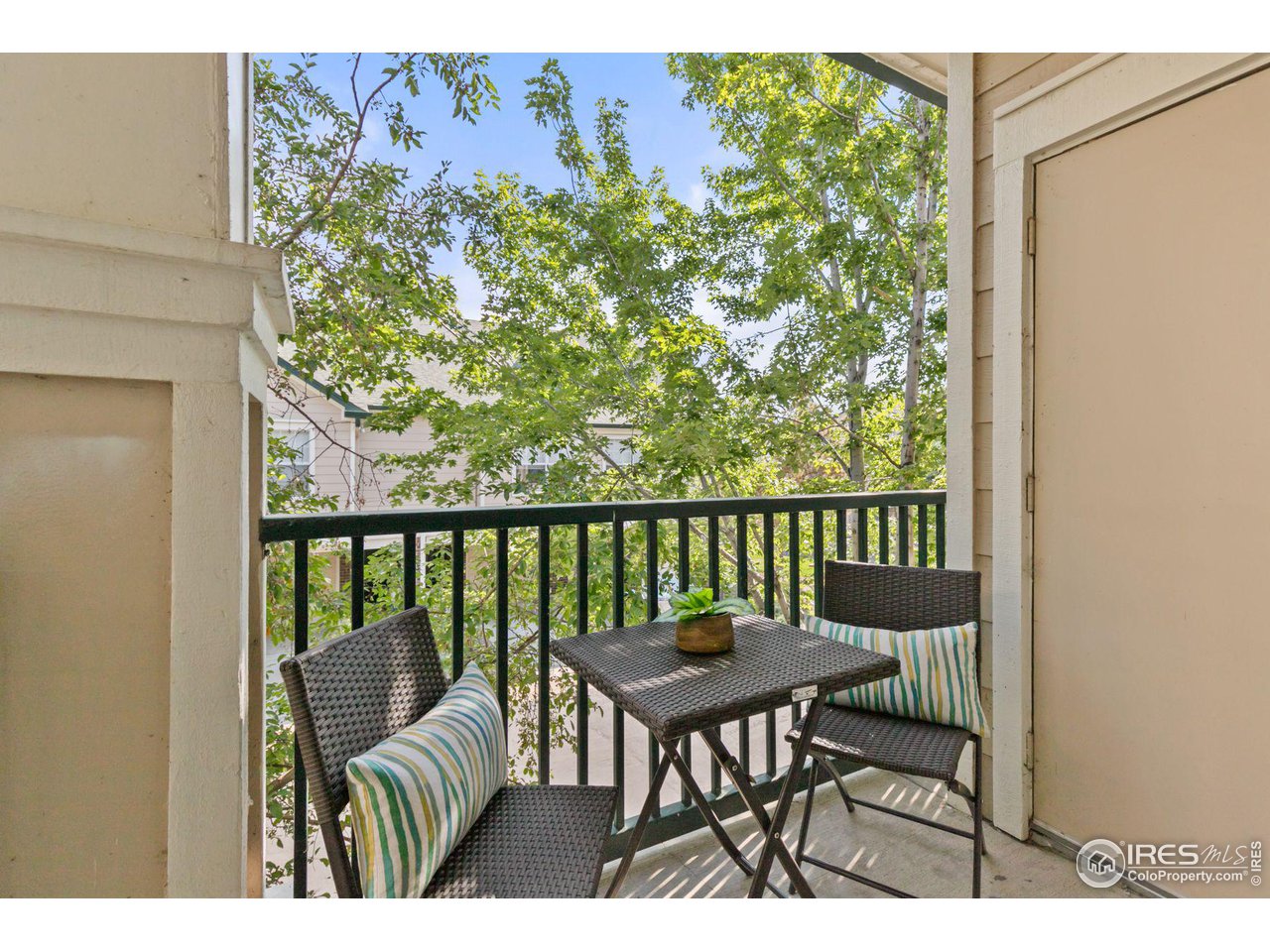1855 Spaulding Circle Superior, CO 80027 - Photo 17 of 32 a view of a chair and table in the balcony