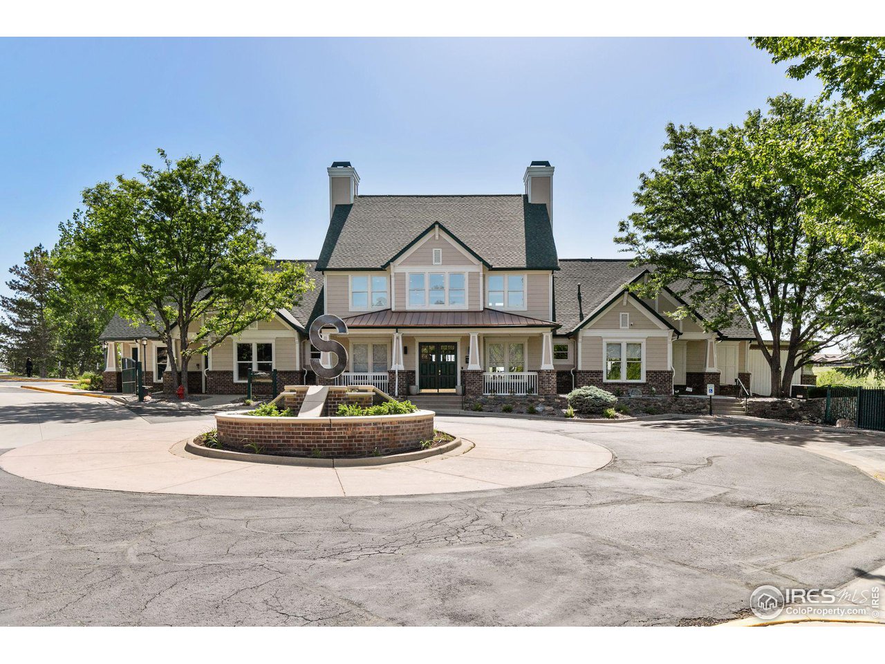 1855 Spaulding Circle Superior, CO 80027 - Photo 20 of 32 a front view of a house with a yard