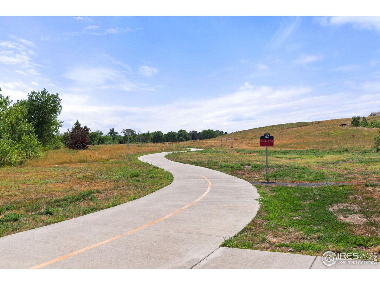 1855 Spaulding Circle Superior, CO 80027 - Photo 32 of 32 a view of a lake with a big yard