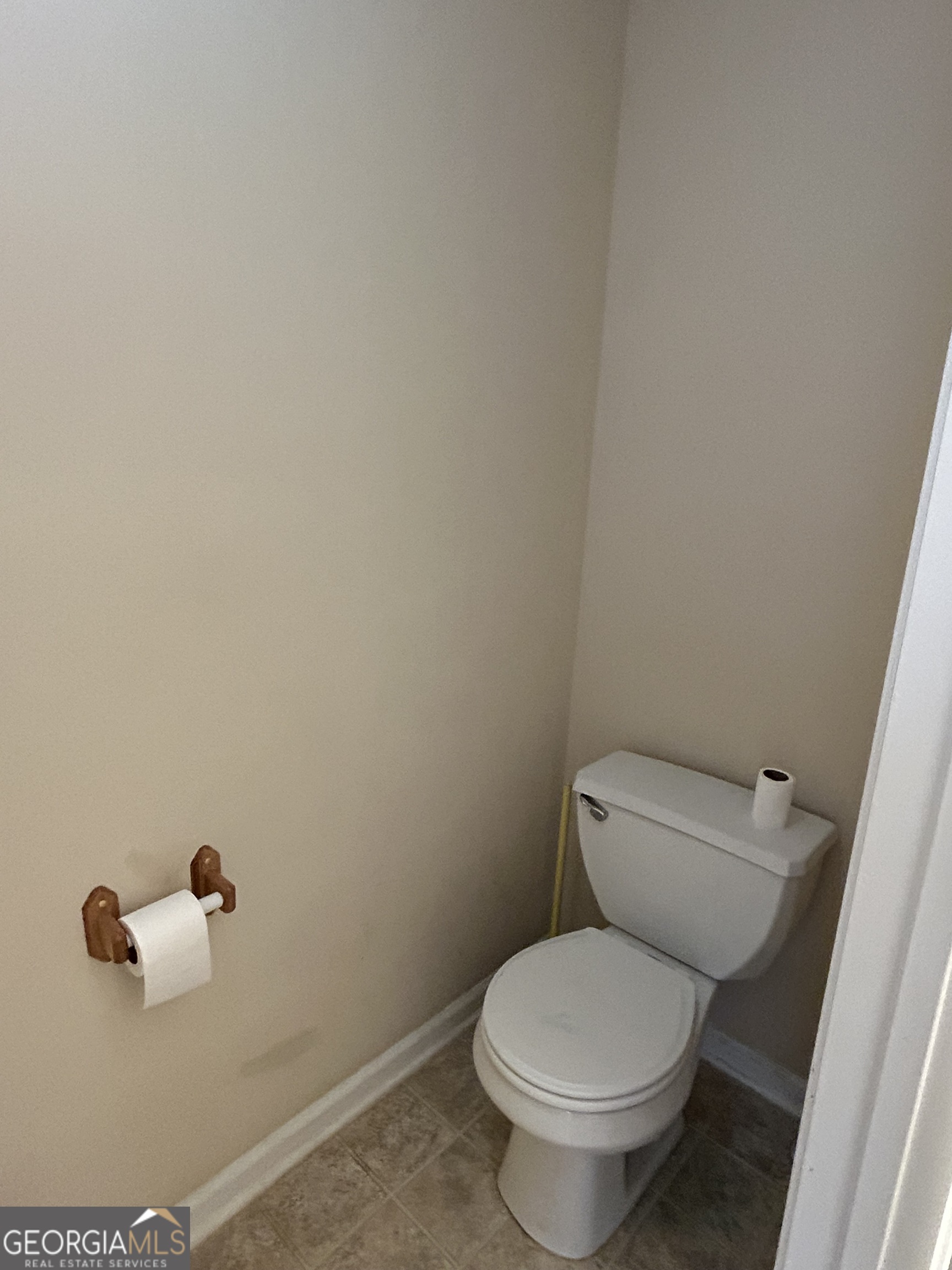 28 Pinewood Circle Colbert, GA 30628 - Photo 23 of 44 a white toilet sitting next to a white wall