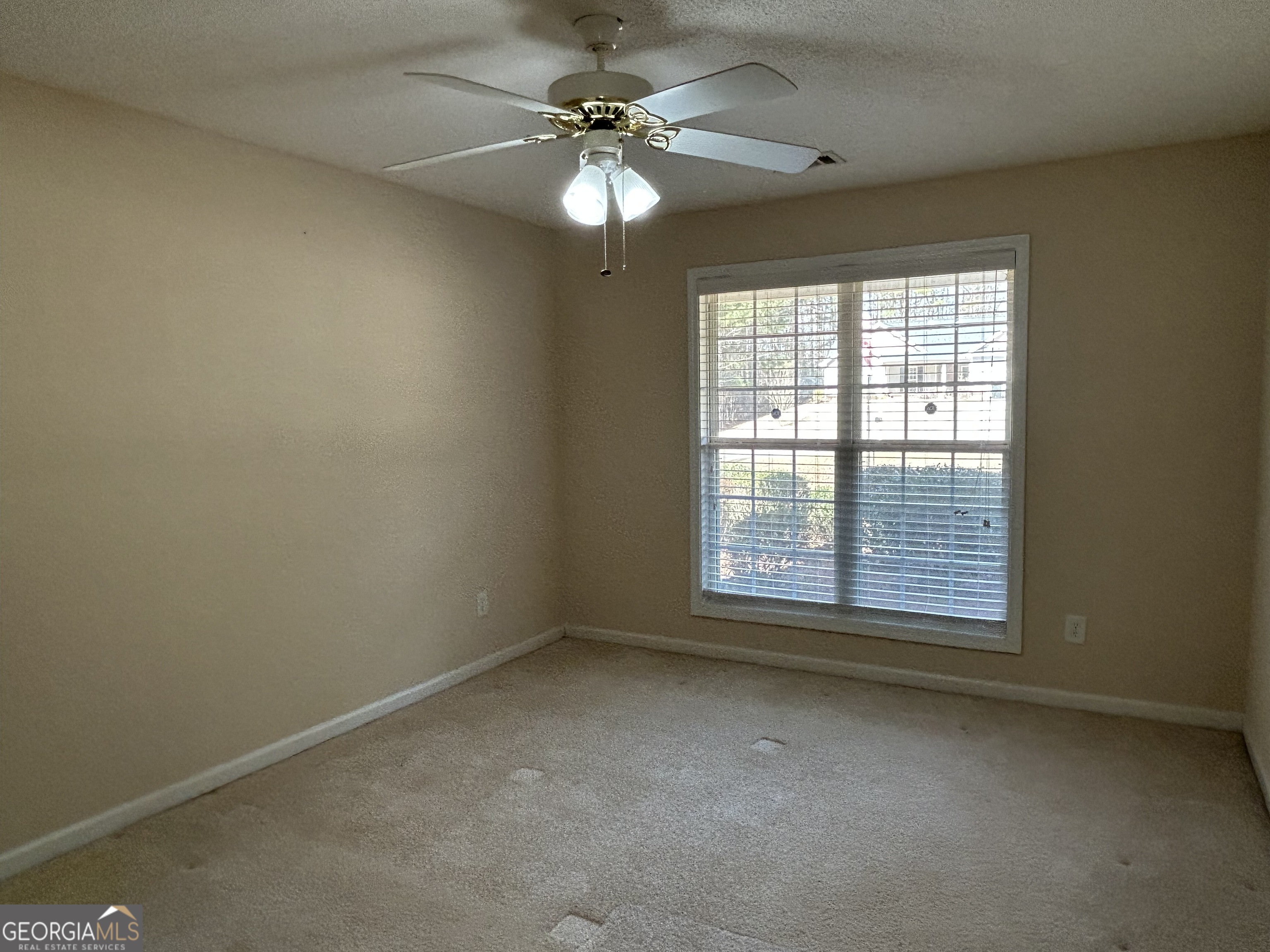 28 Pinewood Circle Colbert, GA 30628 - Photo 26 of 44 a view of an empty room with a window