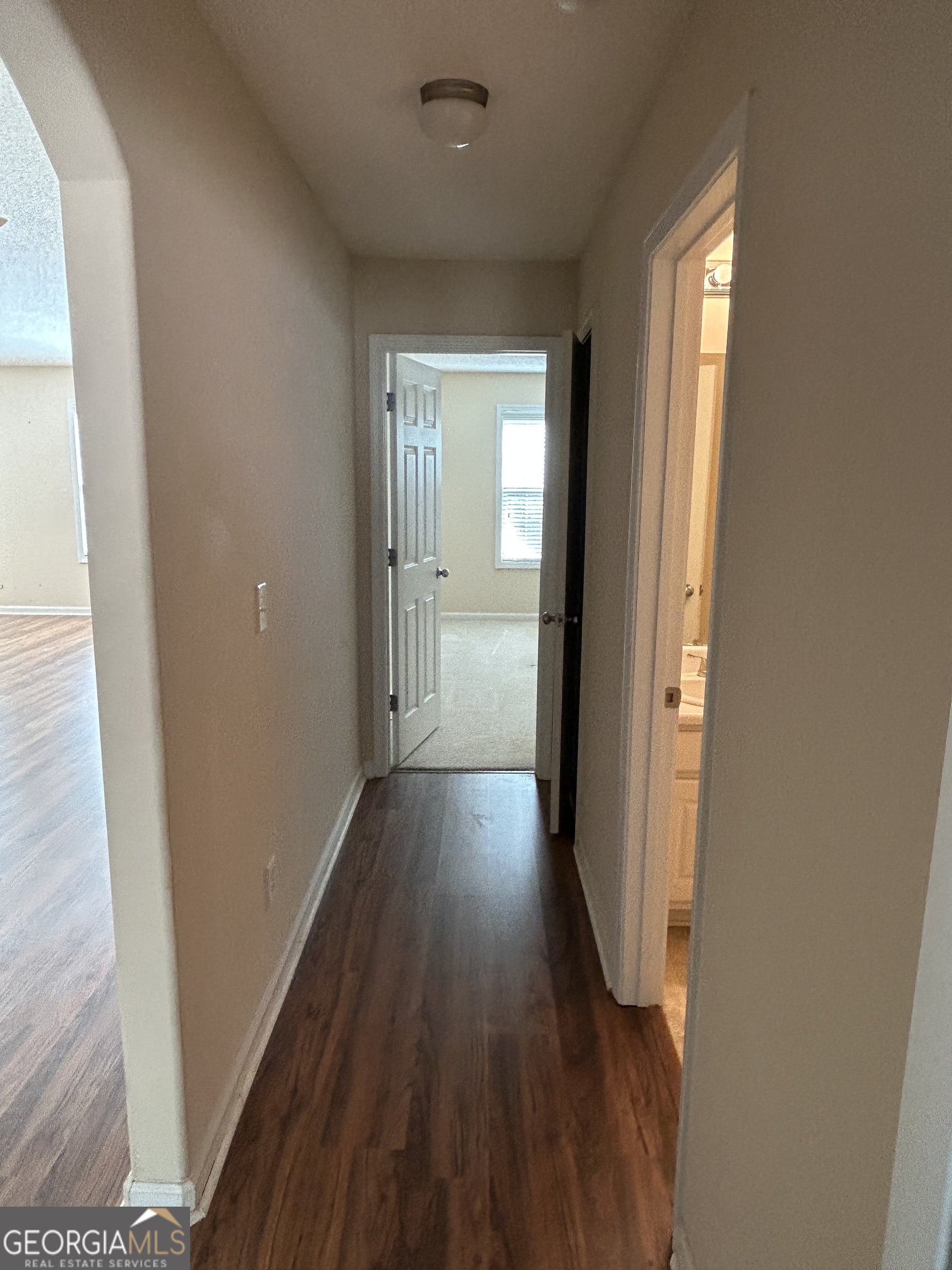 28 Pinewood Circle Colbert, GA 30628 - Photo 28 of 44 a view of a hallway with wooden floor