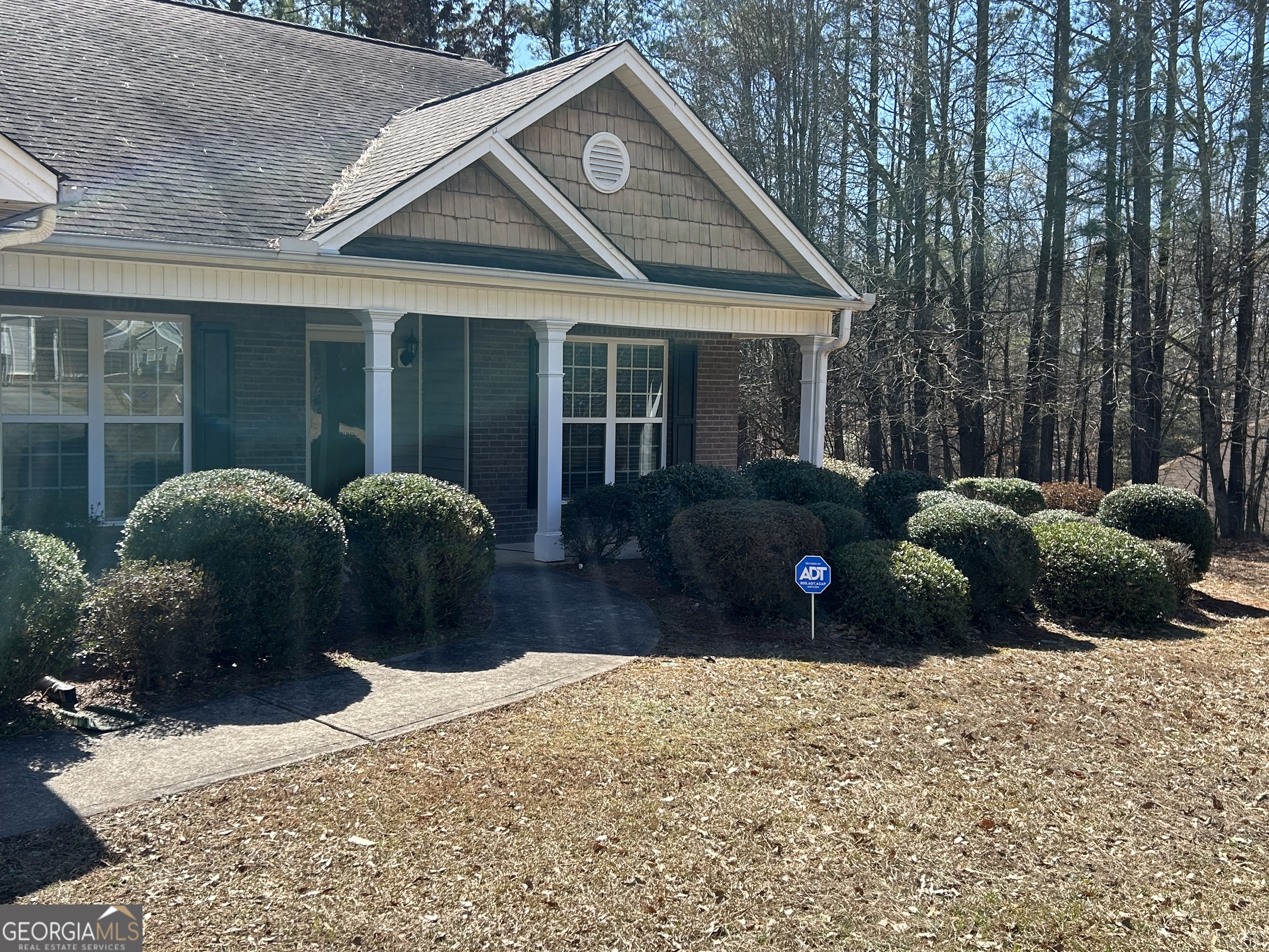 28 Pinewood Circle Colbert, GA 30628 - Photo 3 of 44 a view of a house with a yard and sitting area
