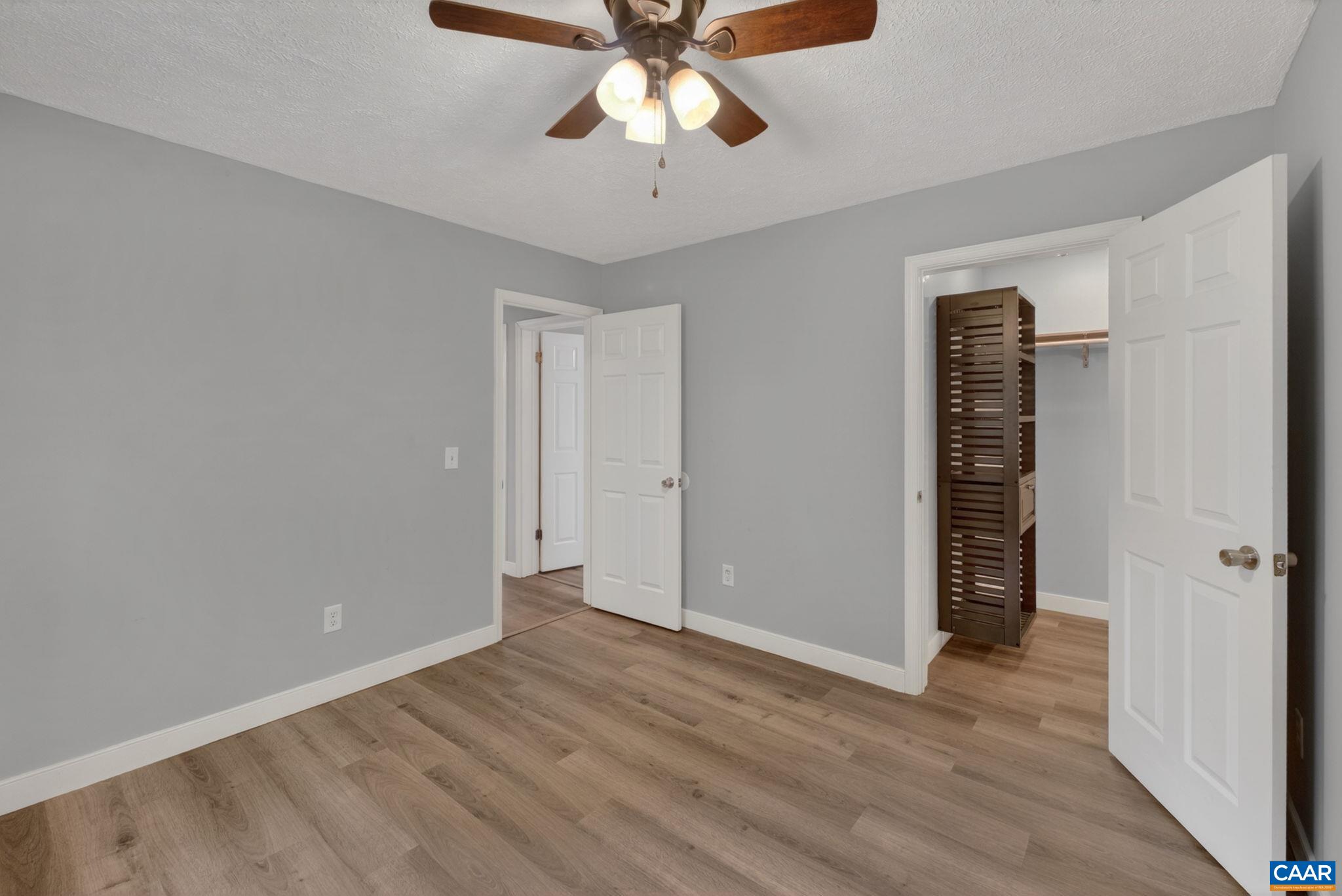 673 Cedar Lane Road Palmyra, VA 22963 - Photo 21 of 47 wooden floor in an empty room with a window