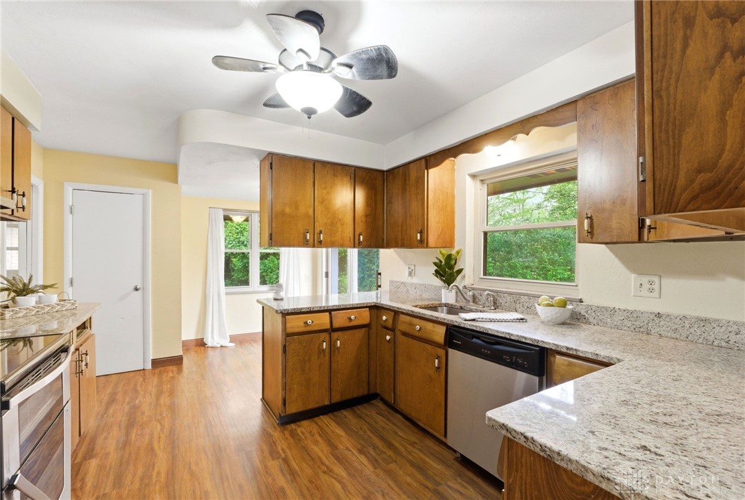2439 Mayfair Road Dayton, OH 45405 - Photo 9 of 41 This spacious kitchen offers ample counter space, abundant natural light, and a functional layout.