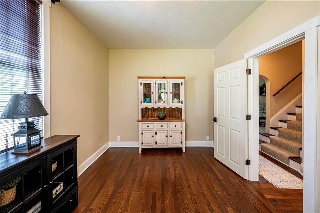26 Raymaley Road Harrison City, PA 15636 - Photo 17 of 38 Another view of the spacious first floor bedroom. The paint palette is great with the warm toned floors and newer white doors with hardware.