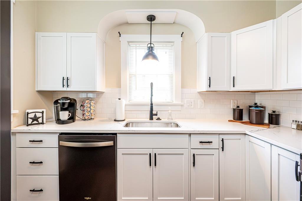 The newer kitchen captures the charm of the old with modern day convenience.