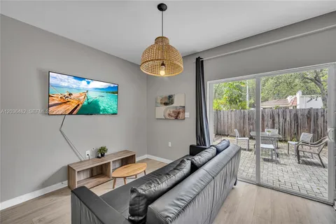 a bedroom with a bed and a table