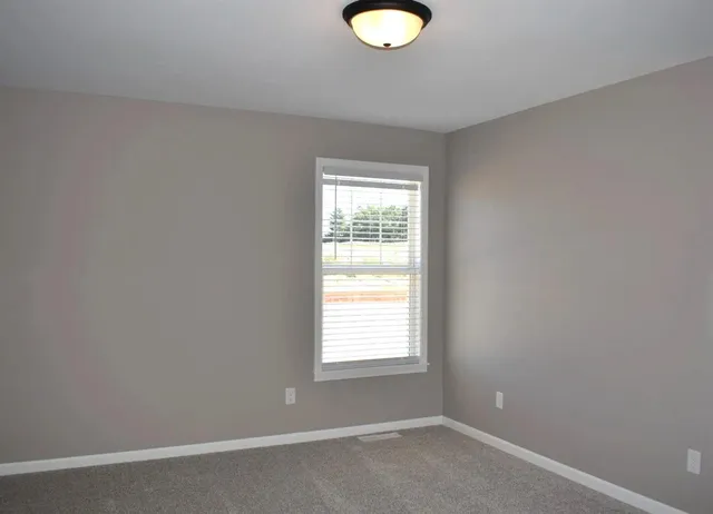 an empty room with a window