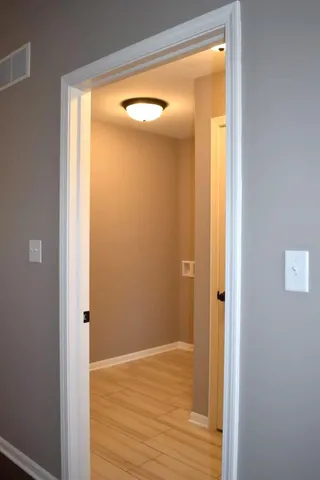 wooden floor & windows in a room