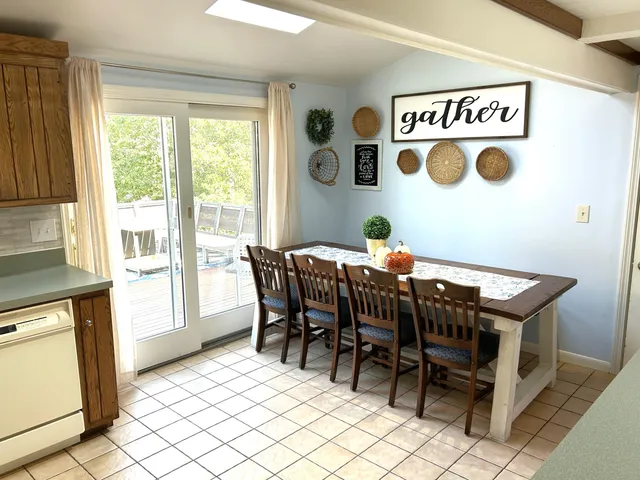 a view of a table and chairs in a room