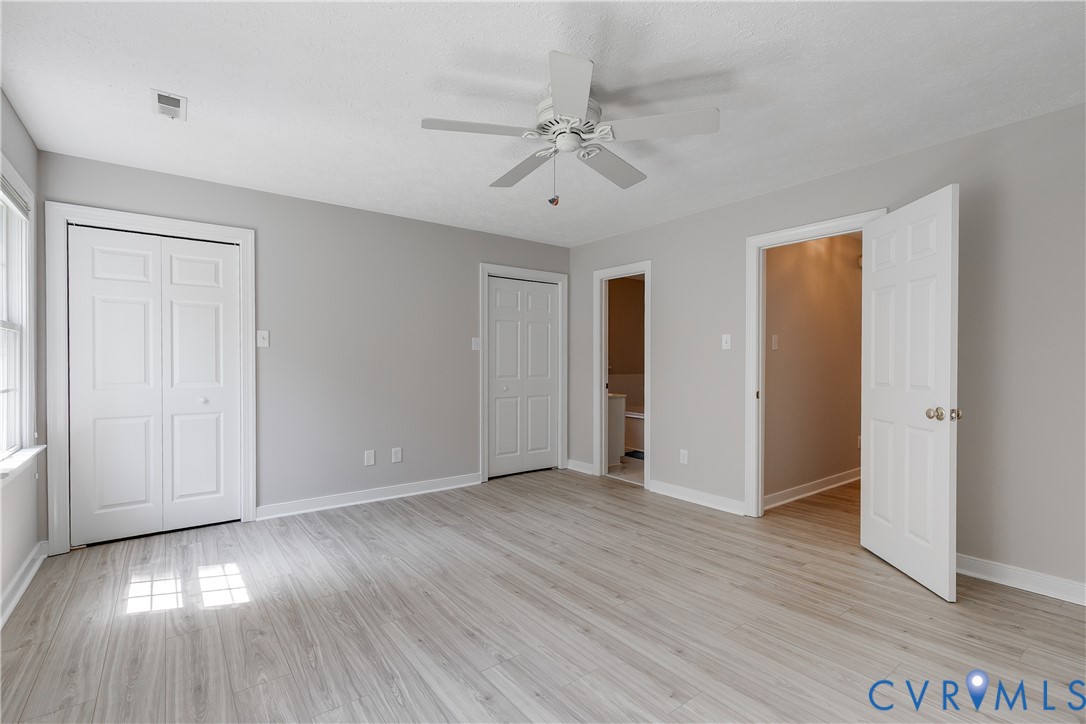 6701 Caboose Lane Sandston, VA 23150 - Photo 13 of 28 With dual closets and a private ensuite