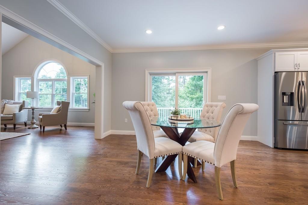 10 College Road Burlington, MA 01803 - Photo 16 of 37 a view of a dining room with furniture window and wooden floor