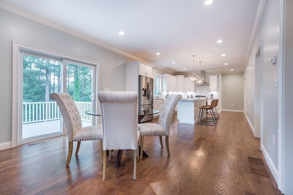 10 College Road Burlington, MA 01803 - Photo 17 of 37 a view of a dining room with furniture window and wooden floor