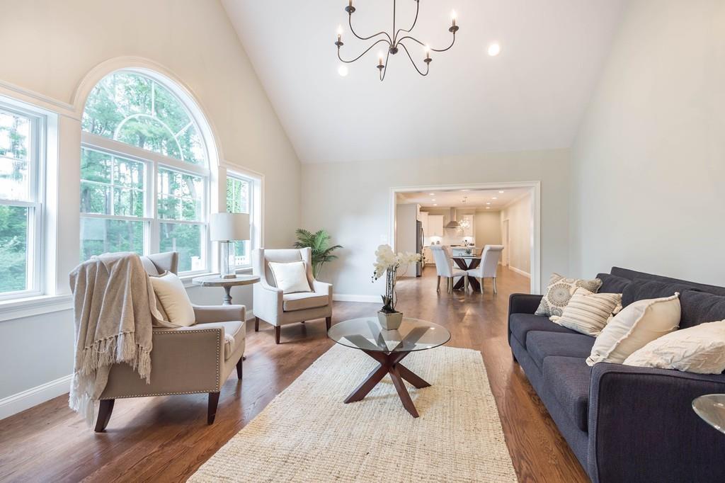 10 College Road Burlington, MA 01803 - Photo 19 of 37 a living room with furniture and a large window