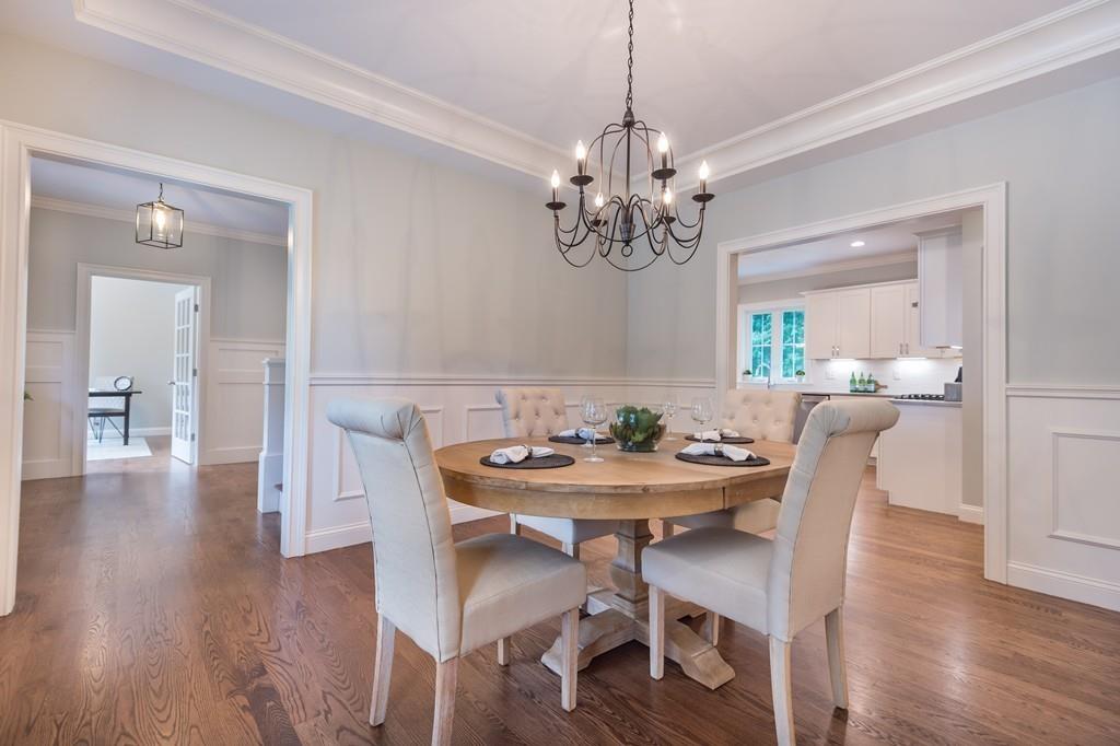 10 College Road Burlington, MA 01803 - Photo 23 of 37 a view of a dining room with furniture wooden floor and chandelier