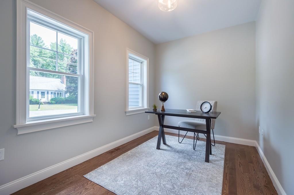 10 College Road Burlington, MA 01803 - Photo 25 of 37 a view of a workspace with furniture and a window