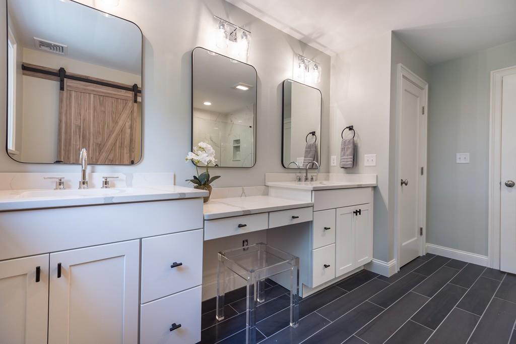 10 College Road Burlington, MA 01803 - Photo 33 of 37 a bathroom with a double vanity sink mirror and