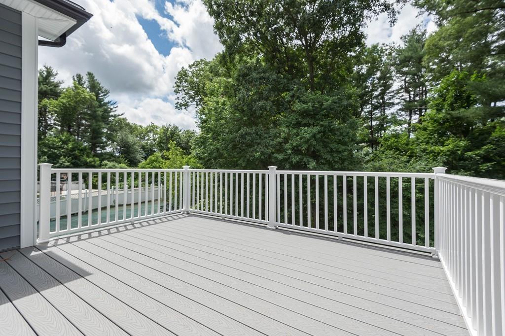 10 College Road Burlington, MA 01803 - Photo 8 of 37 a view of a wooden roof deck