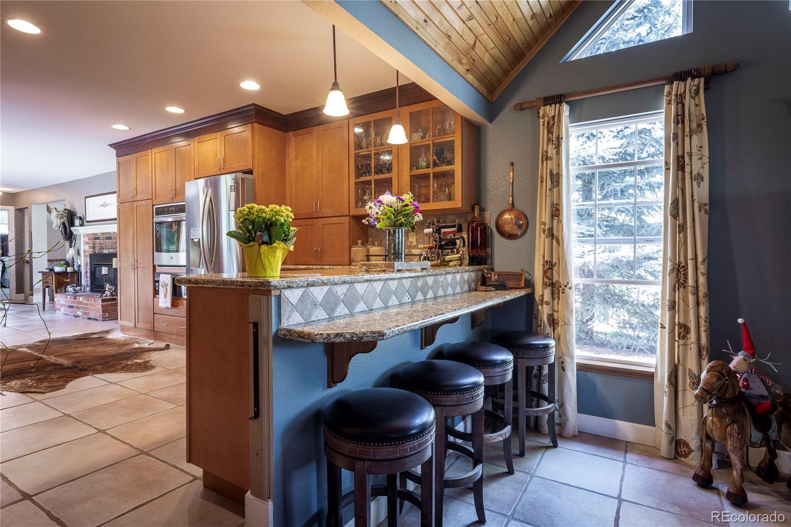 18975 Shadowood Drive Monument, CO 80132 - Photo 13 of 48 a dining room with furniture and window