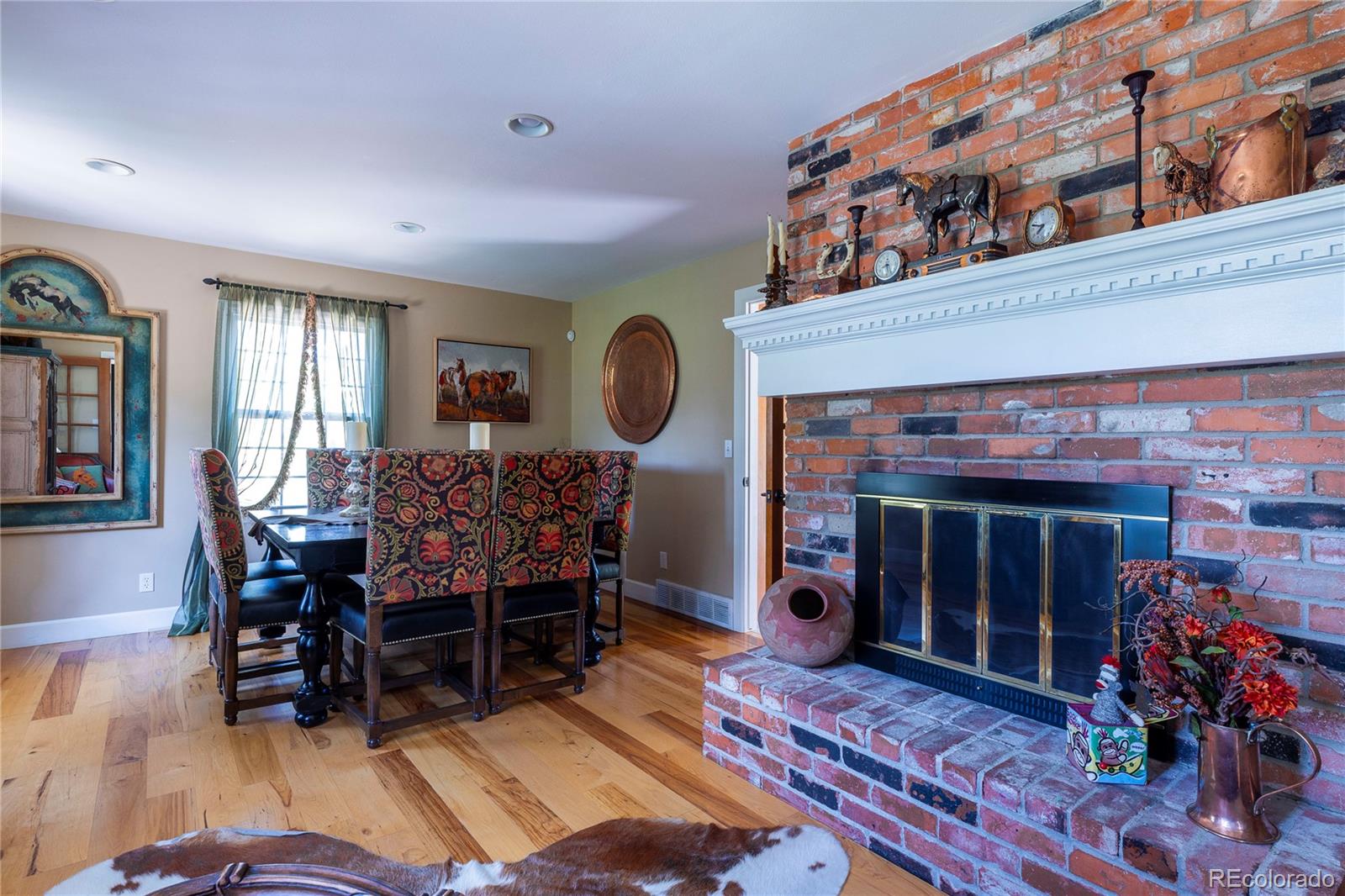 18975 Shadowood Drive Monument, CO 80132 - Photo 14 of 48 a view of a dining room with furniture and window