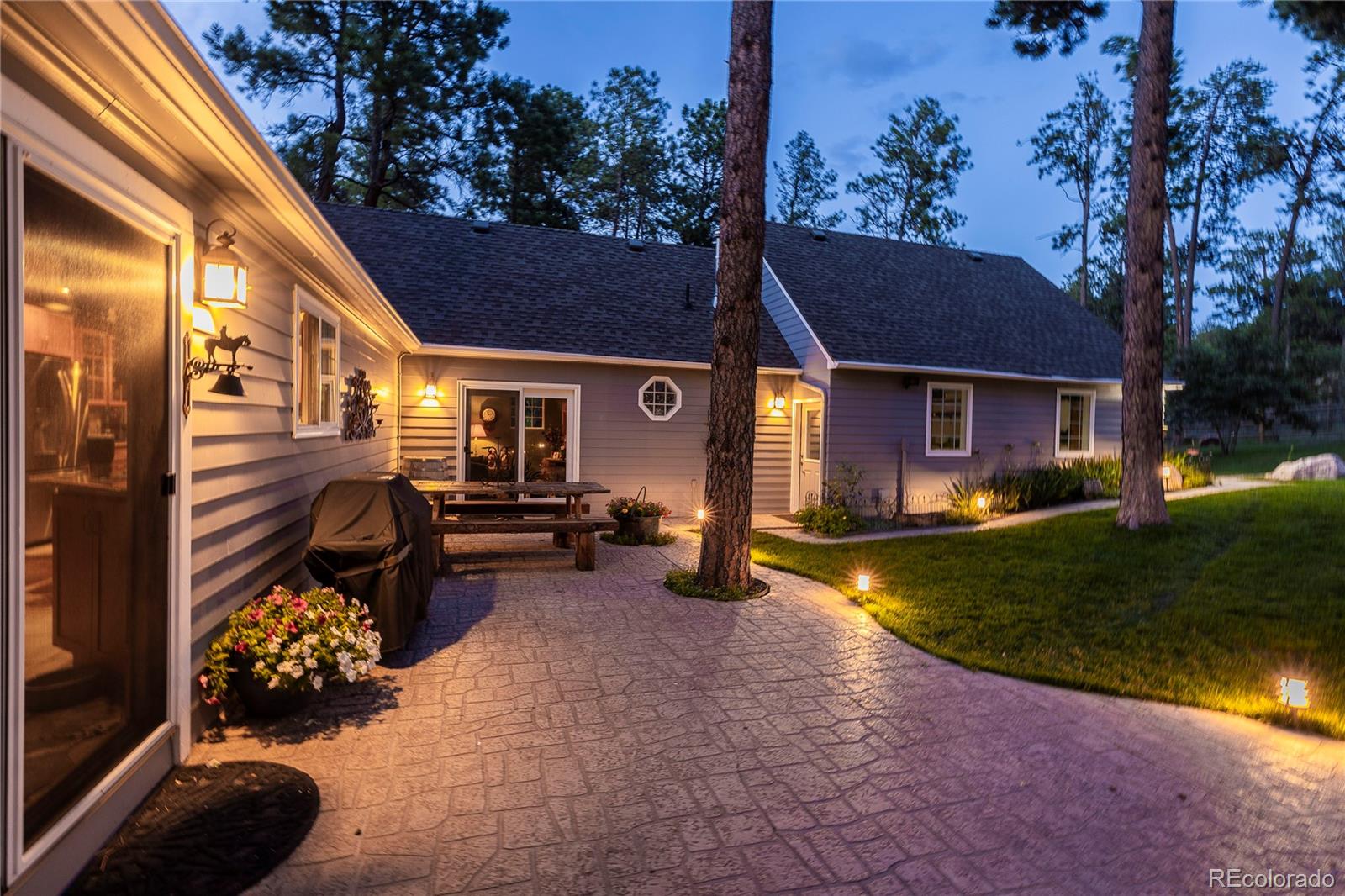 18975 Shadowood Drive Monument, CO 80132 - Photo 38 of 48 a view of a house with a patio