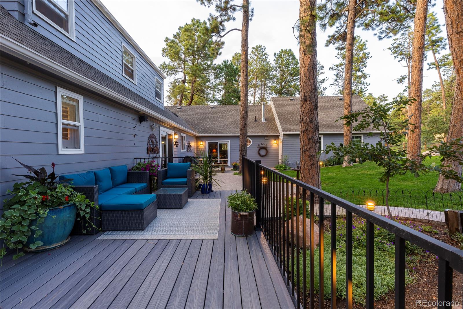 18975 Shadowood Drive Monument, CO 80132 - Photo 44 of 48 a view of a wooden deck with furniture
