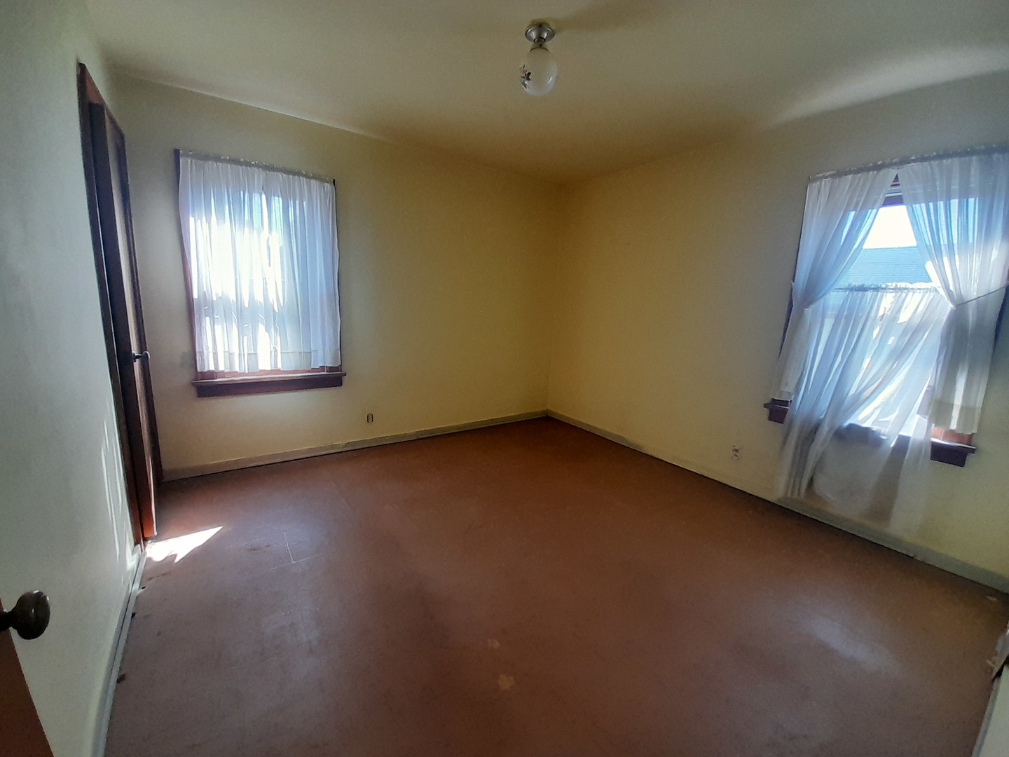 211 4th Avenue Mendota, IL 61342 - Photo 14 of 25 an empty room with a empty space and window