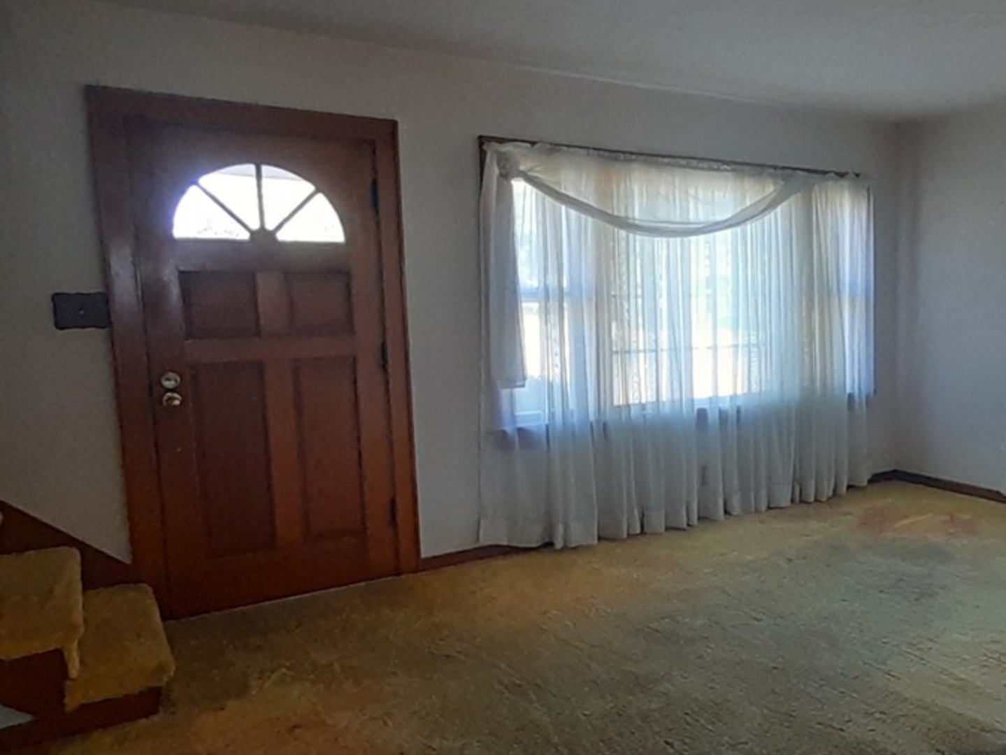 211 4th Avenue Mendota, IL 61342 - Photo 18 of 25 an empty room with a window and doors