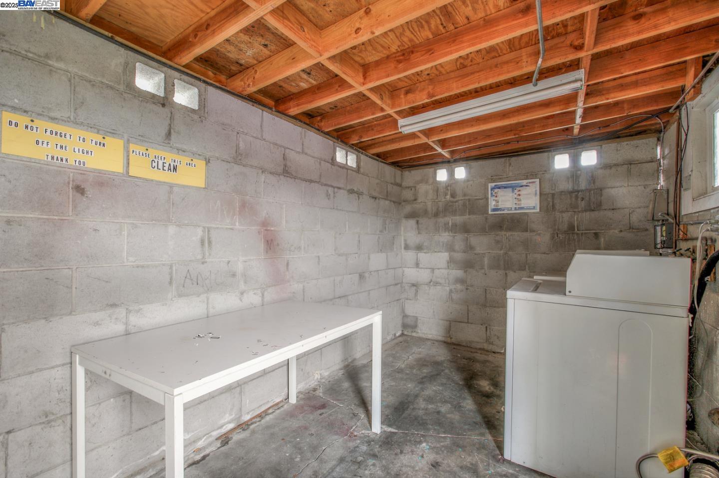 7448 Lockwood Street Oakland, CA 94621 - Photo 27 of 35 a bathroom with a sink and a shower