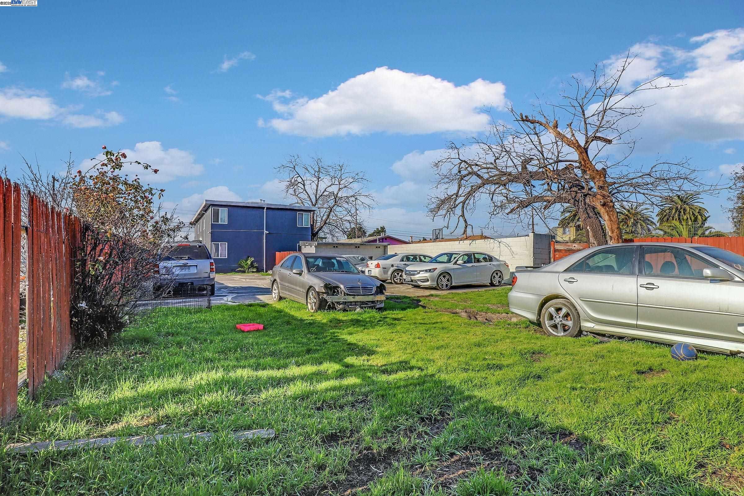 7448 Lockwood Street Oakland, CA 94621 - Photo 33 of 35 a view of yard with car parked