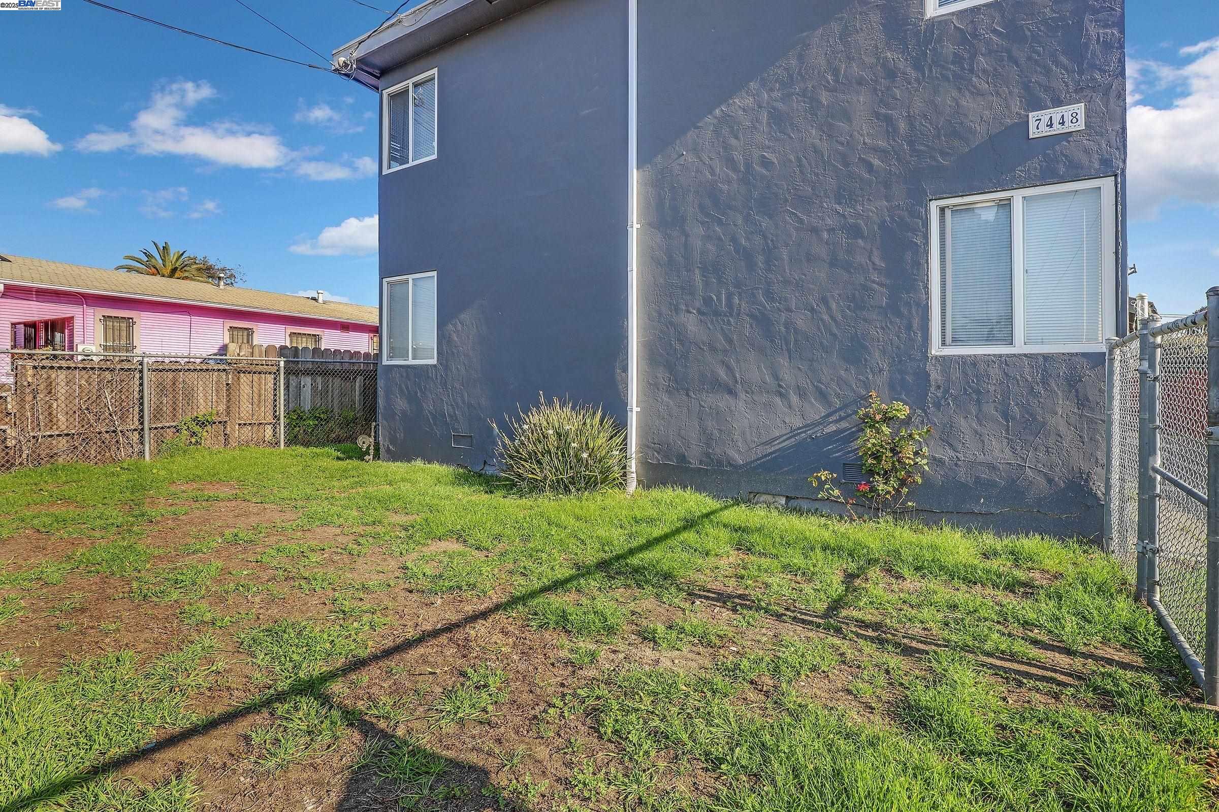 7448 Lockwood Street Oakland, CA 94621 - Photo 34 of 35 a view of a back yard of the house