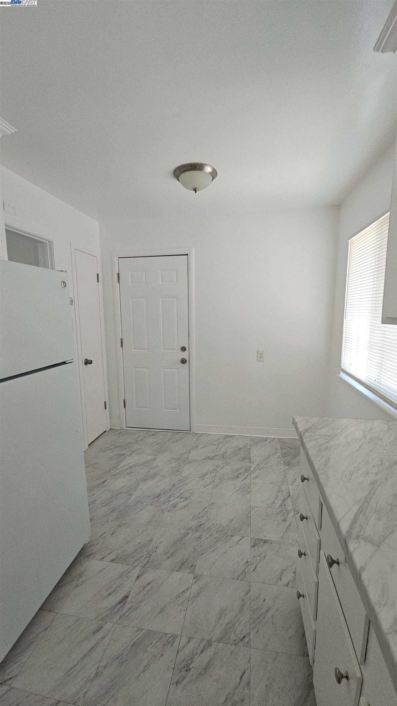 7448 Lockwood Street Oakland, CA 94621 - Photo 6 of 35 a view of an empty room