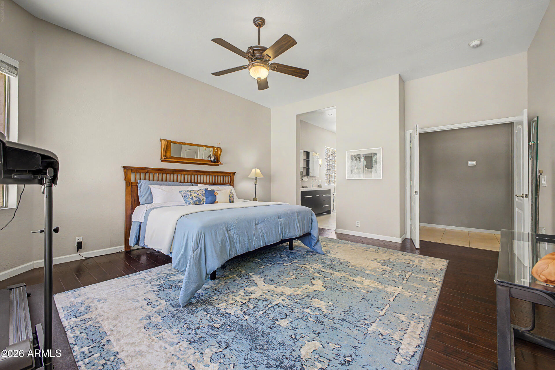 1632 West Frye Road Phoenix, AZ 85045 - Photo 11 of 37 a bedroom with a bed and a ceiling fan