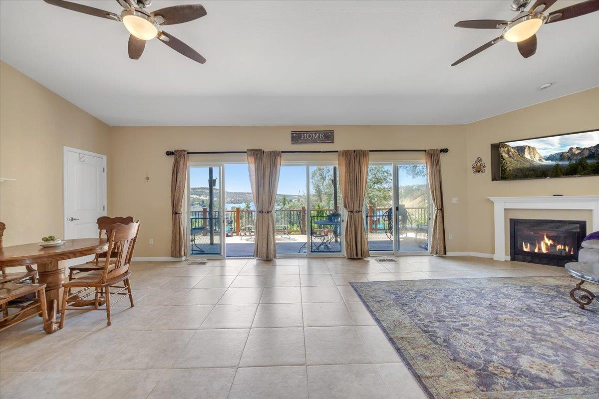 411 Sunrise Road Copperopolis, CA 95228 - Photo 9 of 76 Open concept living/dining area with space for game tables too.